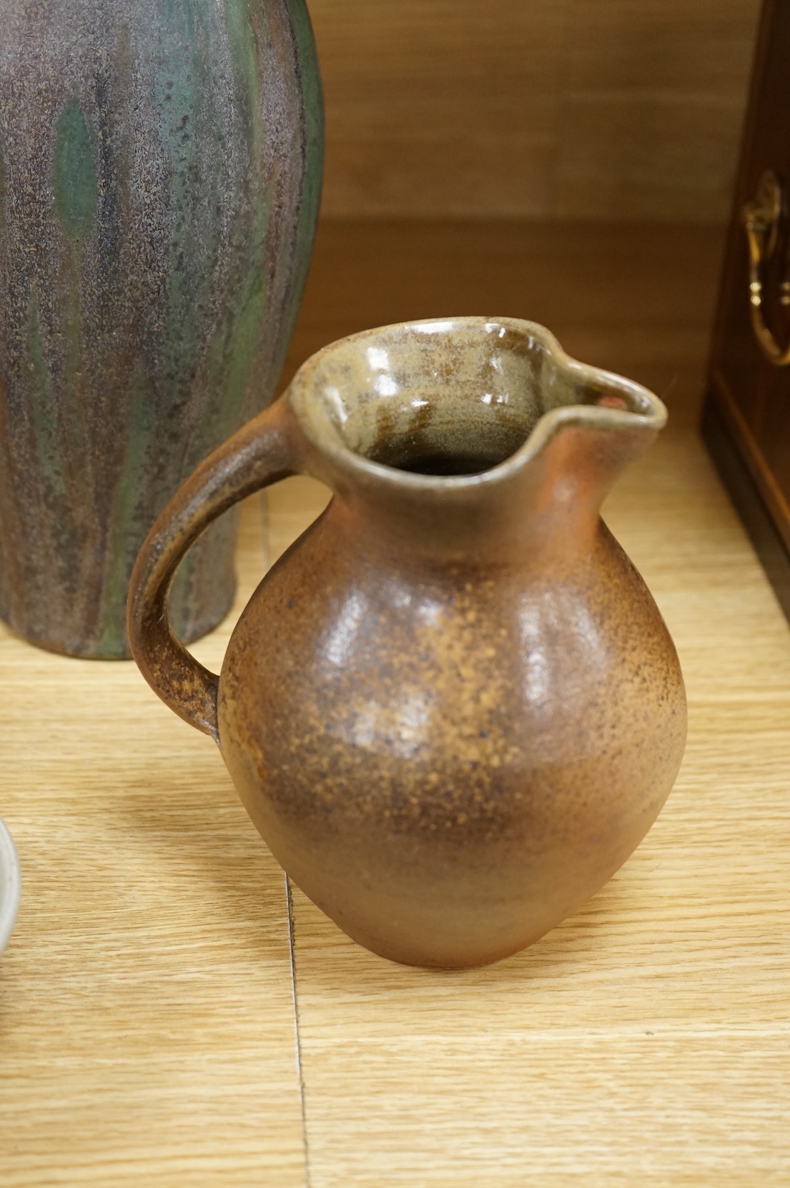 Six pieces of Studio pottery and a vase, largest 32cm high